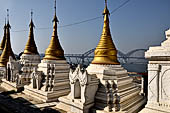 Myanmar - Sagaing, Shwe-kyet-kay a pagoda on a steep bank of the River close to the two parallel bridges linking Sagaing and Amarapura. 